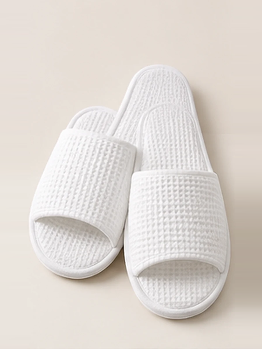 Open-toe waffle hotel slippers